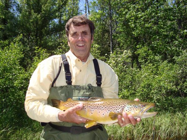 Dad with a nice AuSable River brown trout - this g...