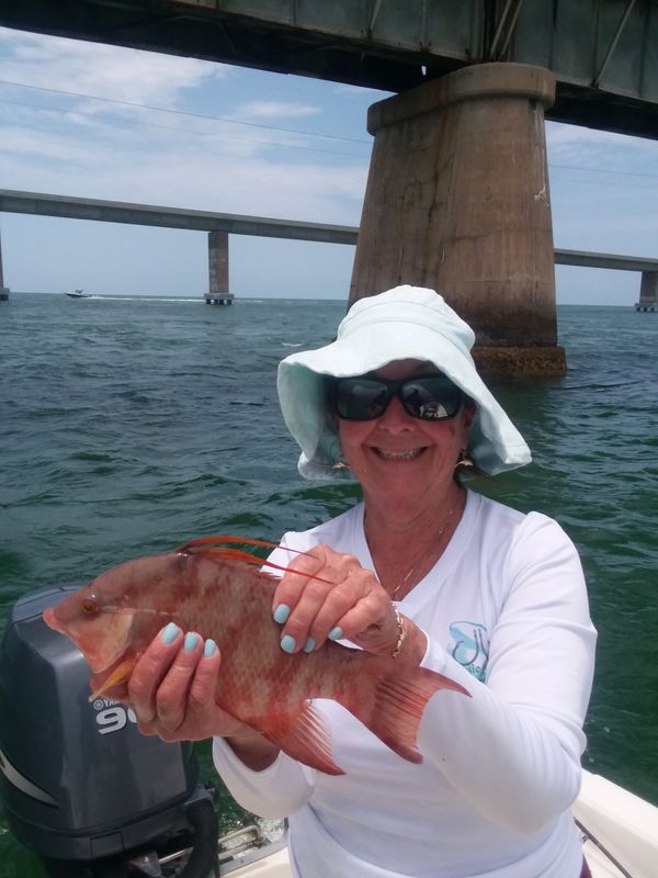 Kathy with a 11 inch Hog Fish...