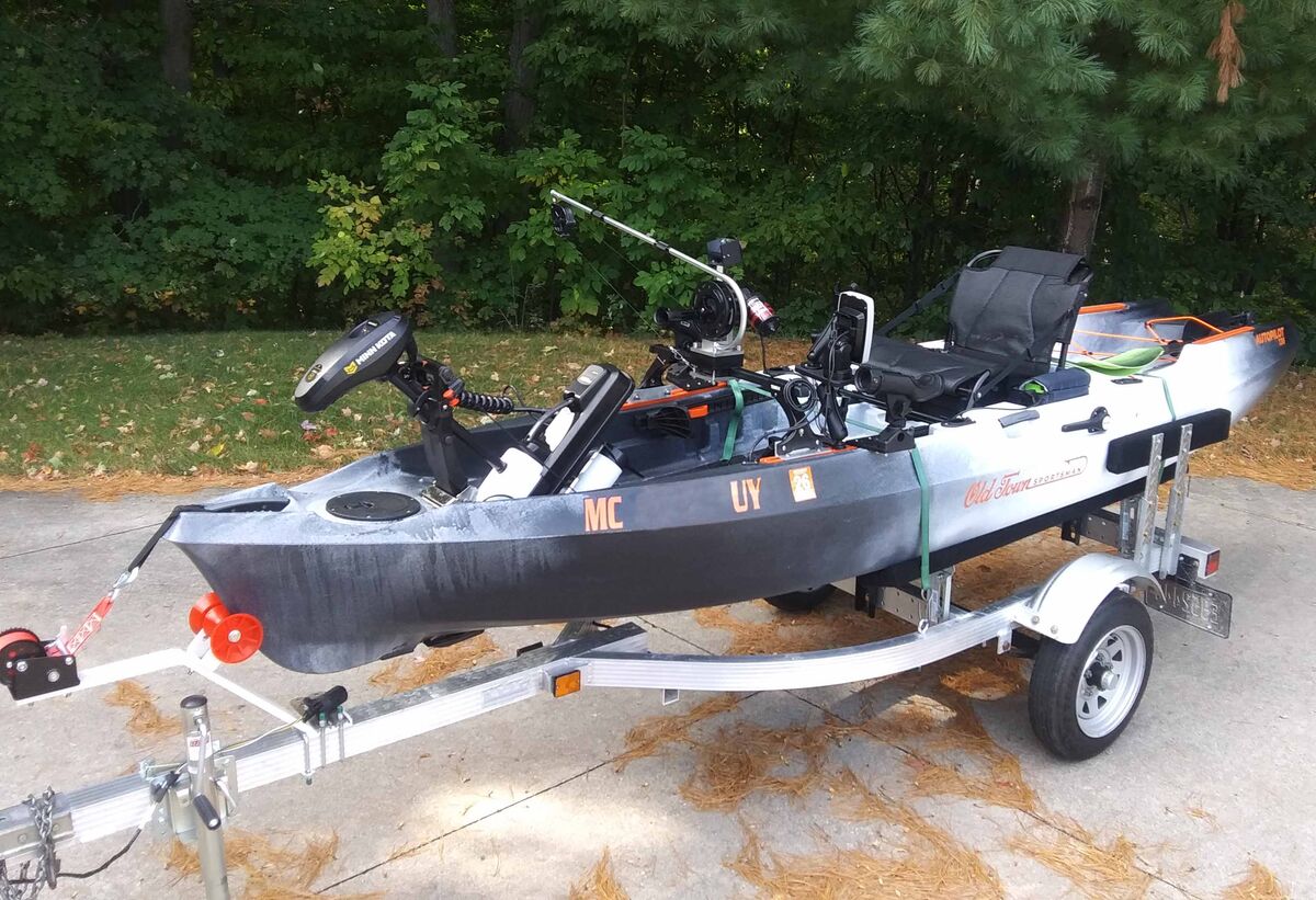 An Old Town Autopilot 13' 6" motorized kayak. Move...