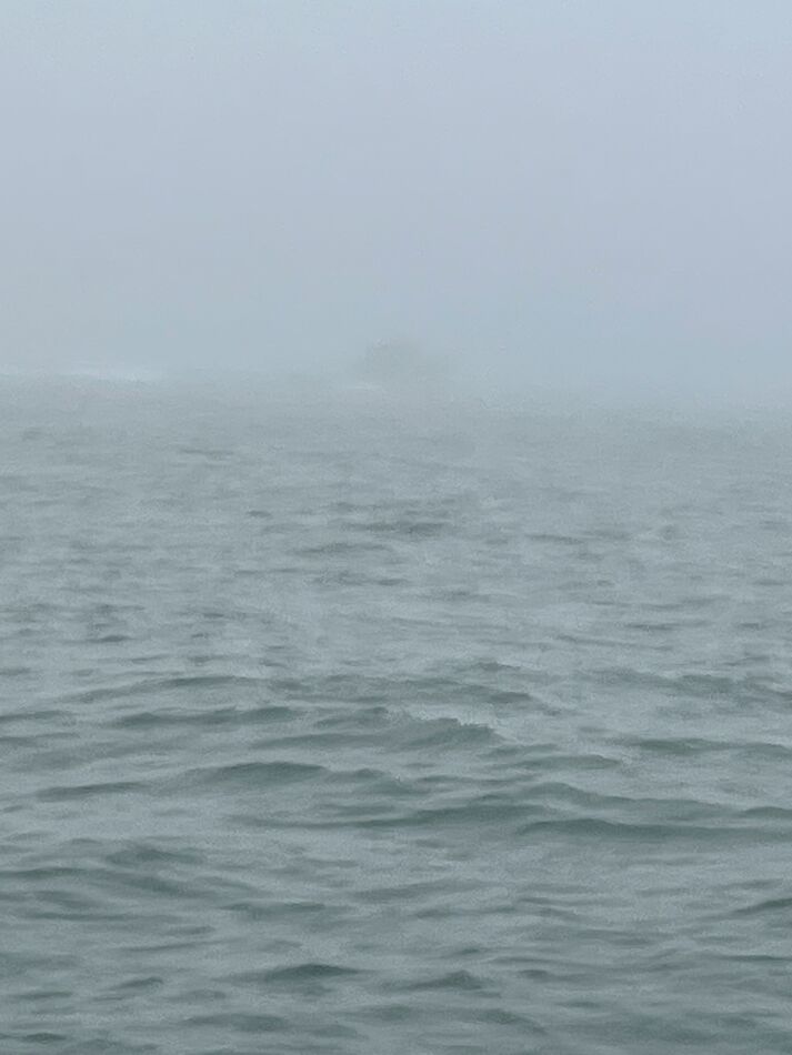 Can you see the other boat in the fog?...