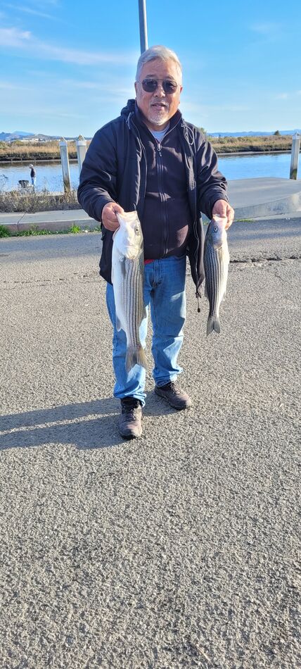 Ben and the catch of the day. The 20 incher looks ...
